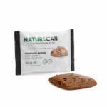A CBD brownie - salted caramel next to a packet of cookies.
