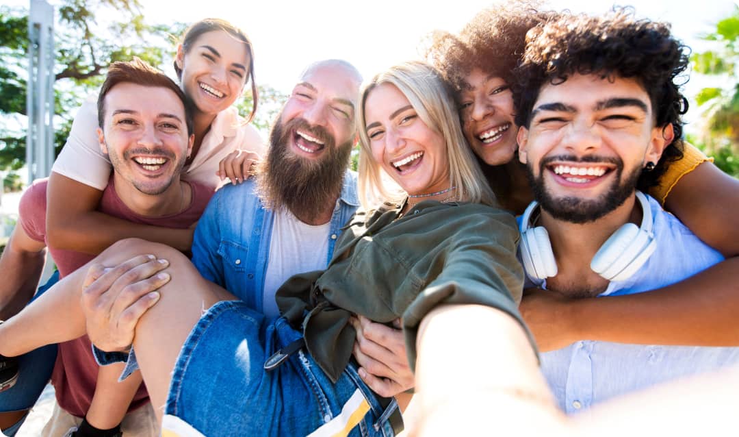 a group of people taking a picture together.