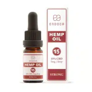 A bottle and box of Endoca - Decarb 15% CBD oil (10ml), 5mg/drop, labeled “Strong,” with red and white branding and product details.